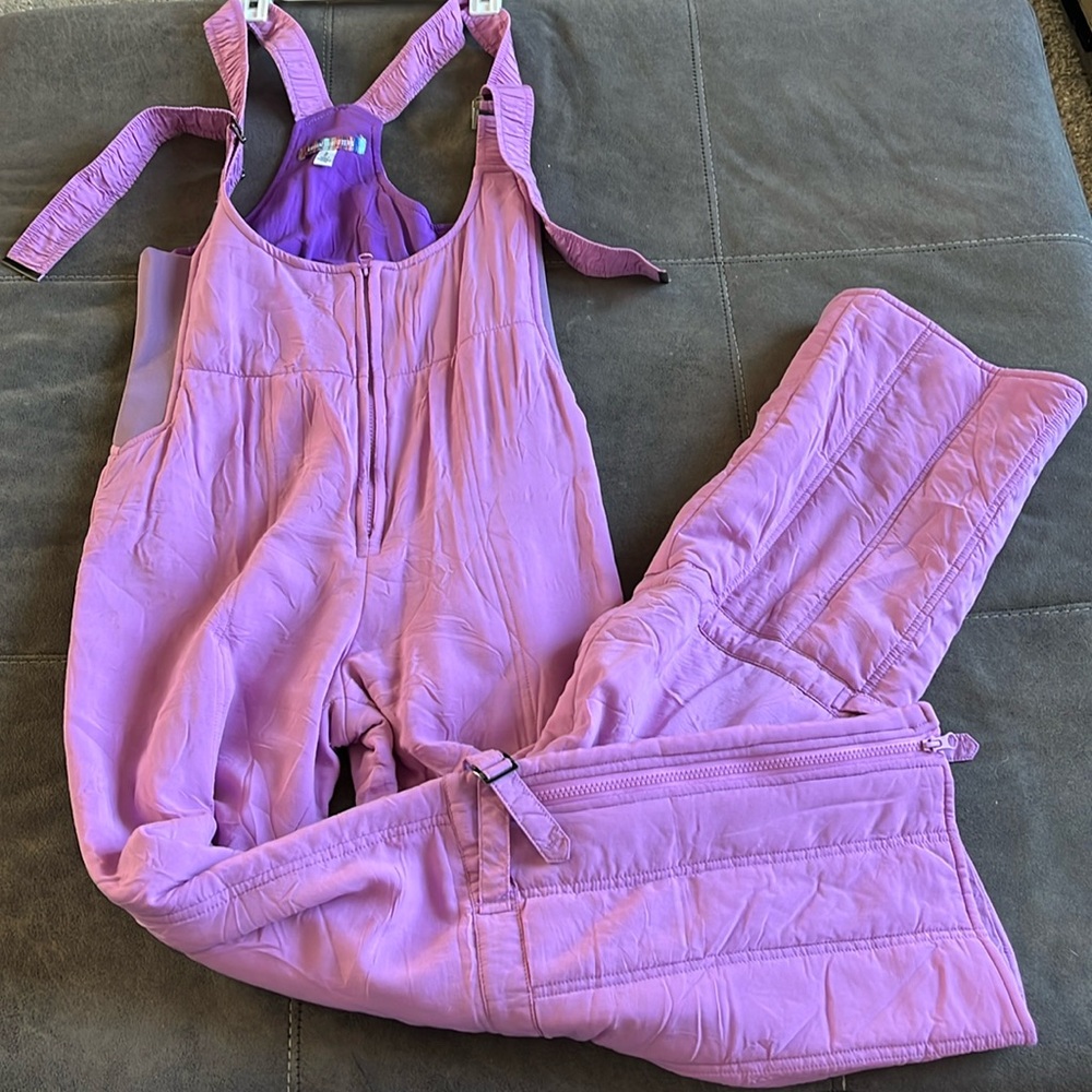Soft, adjustable lavender zip up snow inspired overalls from Urban outfitters